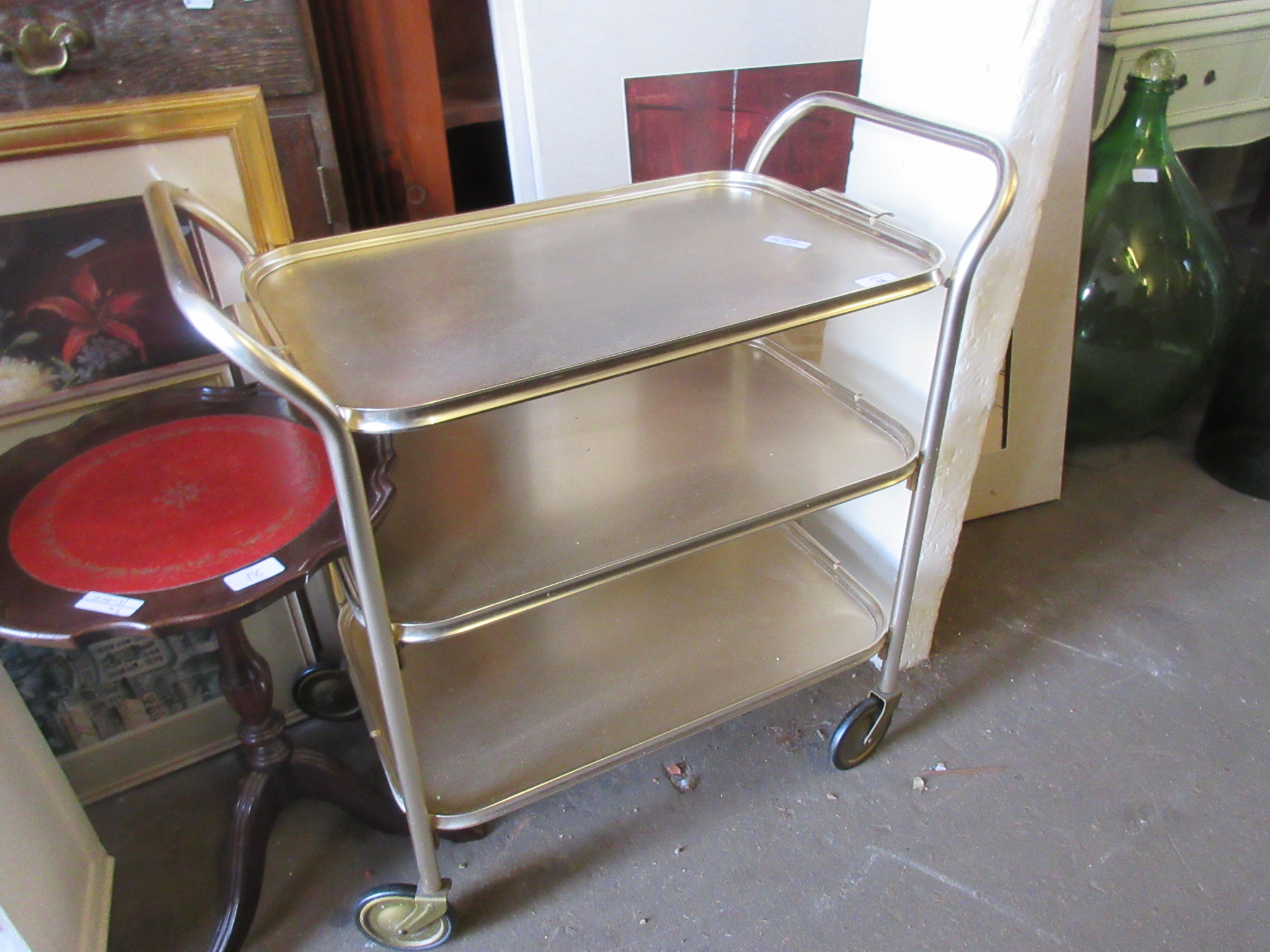 METAL THREE TIER TEA TROLLEY PLUS A SMALL LEATHER TOPPED TRIPOD TABLE