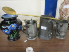 THREE PEWTER MUGS TOGETHER WITH A BRASS LADLE AND ENGLISH FALCONWARE BLACK GLAZED JUG