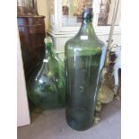 TWO VERY LARGE GREEN GLASS VASES, LARGEST 86CM HIGH