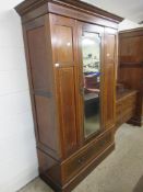 EDWARDIAN BEDROOM SUITE COMPRISING MIRROR FRONTED WARDROBE AND MIRROR BACKED DRESSING TABLE, THE
