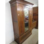 EDWARDIAN BEDROOM SUITE COMPRISING MIRROR FRONTED WARDROBE AND MIRROR BACKED DRESSING TABLE, THE