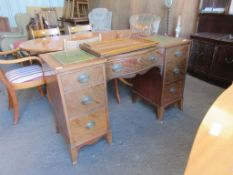 REPRODUCTION LEATHER TOPPED DESK WITH BRASS HANDLES