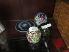 GROUP OF THREE MURANO STYLE GLASS PAPERWEIGHTS TOGETHER WITH A FOSSILISED GLASS EXAMPLE