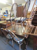 20TH CENTURY EXTENDING TABLE, 115CM WIDE, TOGETHER WITH FOUR ERCOL STYLE DARK WOOD STAINED CHAIRS