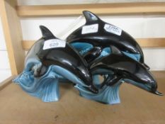 GROUP OF THREE POOLE POTTERY LEAPING DOLPHINS