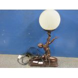 BRONZED EFFECT PAINTED LAMP OF A FIGURE OF A LADY HOLDING GLOBE GLASS LIGHT