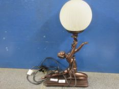 BRONZED EFFECT PAINTED LAMP OF A FIGURE OF A LADY HOLDING GLOBE GLASS LIGHT