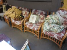 SET OF FOUR MODERN CANE CONSERVATORY ARMCHAIRS, UPHOLSTERED IN CREAM AND RED FLORAL DESIGN, 74CM