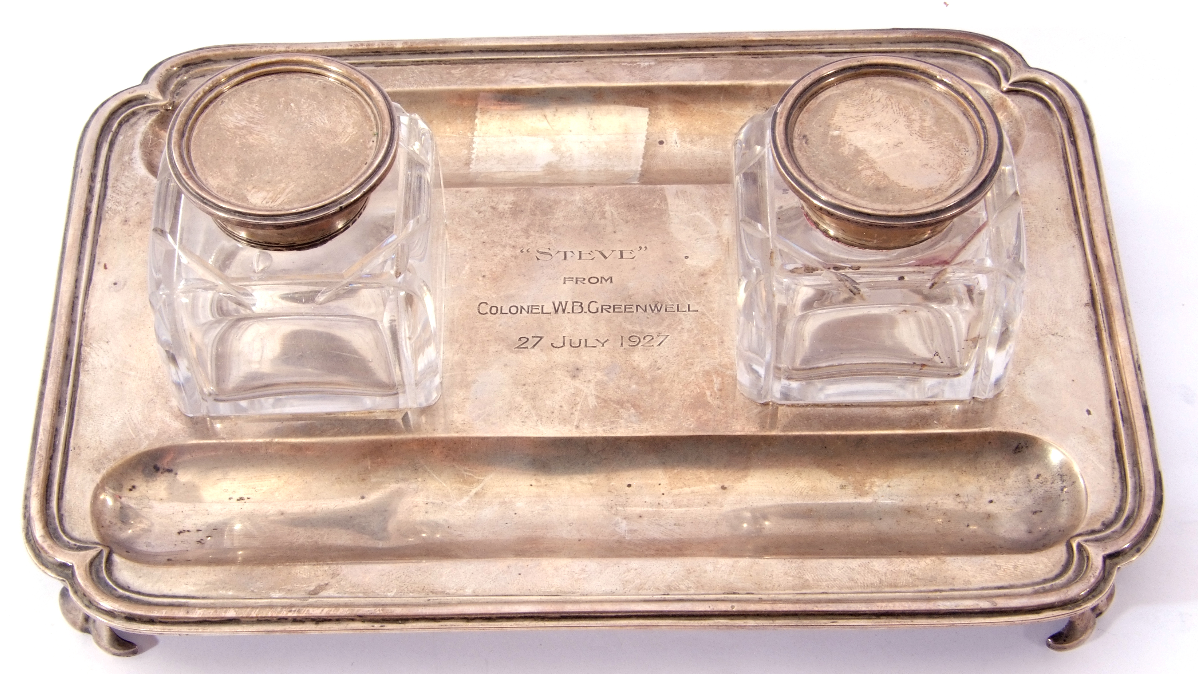 Early 20th Century ink and pen stand of shaped rectangular form, having two glass ink wells with