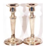Pair of loaded "Sterling" candlesticks, baluster form, raised on spread loaded bases, Birmingham