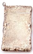 Modern white metal card case of plain polished rectangular form, embossed scrolled edges, stamped