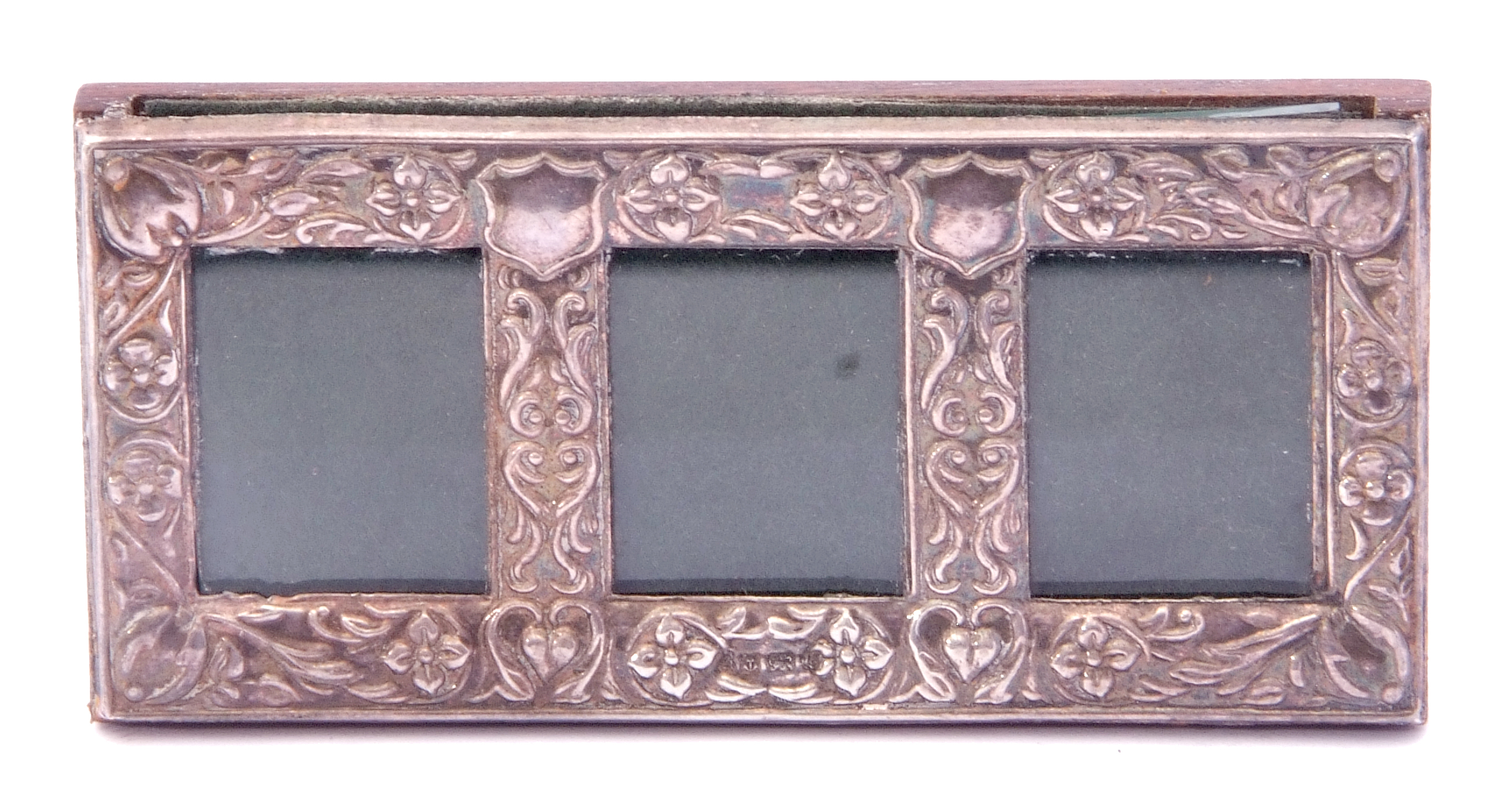 Elizabeth II silver triple glazed photo/stamp frame, embossed decorated with shields, flowers and