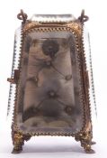 Early 20th century French gilt metal and prism glass panelled travelling watch holder with