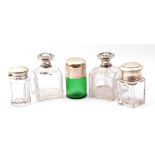 Mixed Lot: two glass table jars with screw on silver lids, Birmingham 1905, a green glass smelling