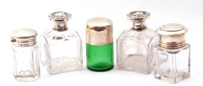 Mixed Lot: two glass table jars with screw on silver lids, Birmingham 1905, a green glass smelling