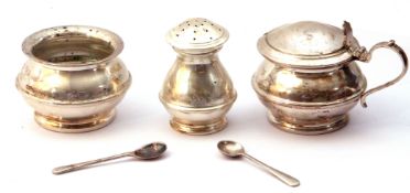 Cased silver condiment set of compressed circular form with ribbed bodies, to include mustard with