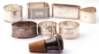 Mixed Lot: 7 various silver napkin rings, to include Victorian buckle example, engraved "Charlotte",