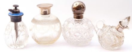 Mixed Lot: two glass globular shaped scent bottles with hallmarked silver screw on lids, a glass