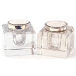 Pair of late Victorian glass and silver inkwells of square faceted form with silver gadrooned lids