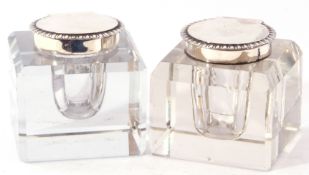 Pair of late Victorian glass and silver inkwells of square faceted form with silver gadrooned lids