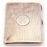 Victorian silver card case of shaped rectangular form with central circular engraved cartouche,