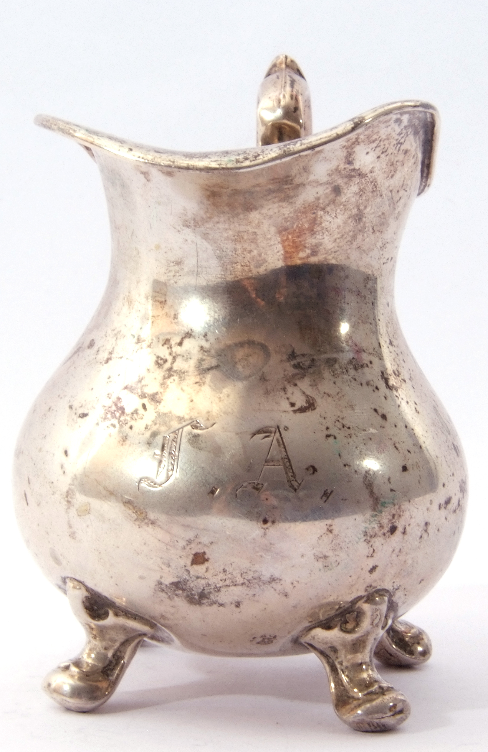 Continental white metal small cream jug of round bellied form with ornate scroll handle, capped - Image 3 of 6