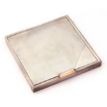 George VI silver compact of square form, engraved with an Art Deco design, fitted mirror to inside