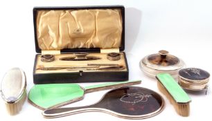 Mixed Lot: Cased George V manicure set comprising nail buffer, two jars and three manicure items,