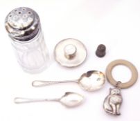 Mixed lot. Mid 20th Century silver baby's rattle/teether, a naturalistic design of a seated cat,