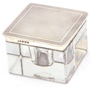 Art Deco silver & glass inkwell, the hinged lid with engine turned decoration to a plain polished