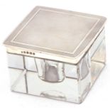 Art Deco silver & glass inkwell, the hinged lid with engine turned decoration to a plain polished