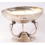 George V silver bon-bon dish, the circular shallow dish supported on three art nouveau style handles