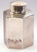 George V silver hexagonal tea caddy of plain polished design, gilt lined with pull off cover, 9 cm