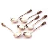Cased set of six white metal tea spoons each with thistle top, twisted stems and round bowls, made