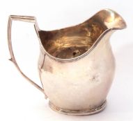 George III silver helmet cream jug, bellied shaped with reeded square topped handle and rims, hall