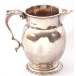 Edward VII silver cream jug in sparrow-beak style, having a round baluster body, leaf capped