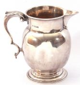 Edward VII silver cream jug in sparrow-beak style, having a round baluster body, leaf capped