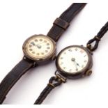 Mixed Lot: two early 20th century ladies silver cased wrist watches on leather straps (2) (a/f)