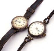 Mixed Lot: two early 20th century ladies silver cased wrist watches on leather straps (2) (a/f)