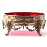 Late 19th/early 20th century Continental white metal circular bowl holder with rams head and swag