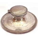 Silver capstan inkwell of typical form, the hinged lid and base with reeded borders to edges, no