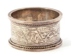 Cased late Victorian Silver Serviette Ring chased and engraved with a geometric design and a