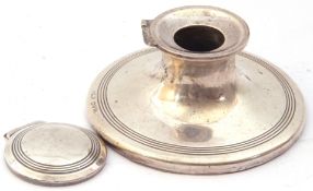 Edward VII silver capped inkwell, domed lid and base with reeded edges, hall marked Chester 1910,