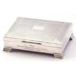 Silver table-top cigarette box, hinged lid with engine turned decoration, presentation engraved