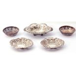 Mixed lot. Pair of Victorian silver bon bon dishes of oval form, pierced and embossed on four ball