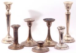 Quantity of silver candlesticks (a/f) (all loaded)