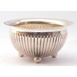 Victorian silver bowl of circular form with fluted body standing on three ball feet, hall marked