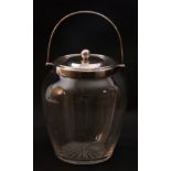 George V glass biscuit barrel of plain design with star cut base, having applied silver collar,
