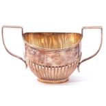 Edward VIII twin handled sugar bowl of oval form with half fluted body and two angular handles, hall