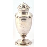 George V Silver caster of plain baluster form with pierced pull off dome lid on a spreading foot (